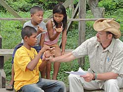 PCV Allen Neece with 13 yr old boy just learning sign language — Guyana