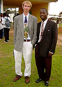 Author Jason Gray and Jean Pierre Bayet at formal school event in 2003 (photo by Aristide Kassangoye 2003