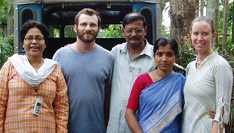 Josh (second from left) and Sutay (far right) with hosts in India
