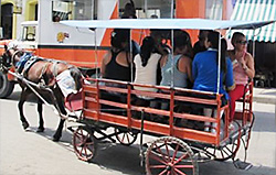 Cart with attached truck modified as a bus, Santa Clara