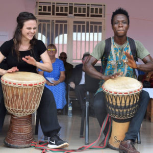 Lisa with her friend and teacher Soumah Zakaria. They play djembe together at the Peace Corps Guinea swearing in Ceremony. Both are also featured in the video.